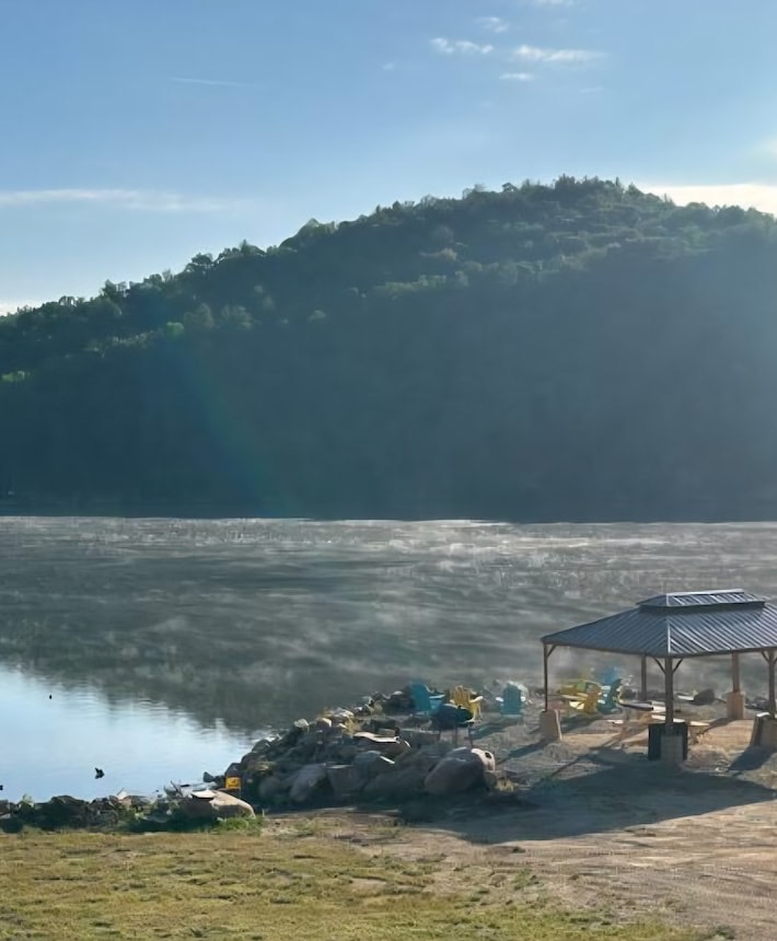 Morning mist rising off the lake at the 14x22 covered pavilion