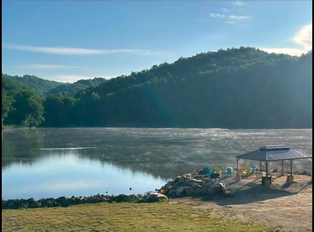 Misty morning on the lake by the dock